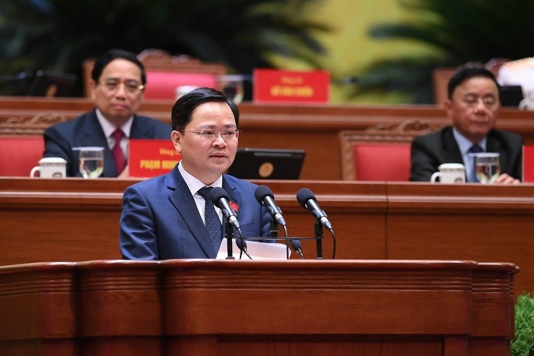 Đồng chí Nguyễn Anh Tuấn, Phó Trưởng Ban Chính sách, chiến lược Trung ương trình bày tham luận tại Đại hội XIV của Đảng. Ảnh: ĐH